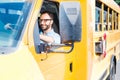 handsome school bus driver smiling Royalty Free Stock Photo