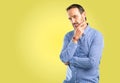 Handsome senior man isolated over yellow background Royalty Free Stock Photo