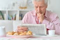 Senior man reading newspaper Royalty Free Stock Photo