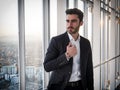 Serious man standing inside modern building Royalty Free Stock Photo