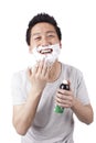 Handsome shaving man