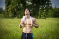 Handsome shirtless fit young man at countryside Royalty Free Stock Photo