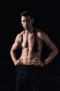 handsome shirtless man standing akimbo and looking at camera isolated Royalty Free Stock Photo
