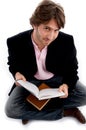 Handsome sitting male with books Royalty Free Stock Photo