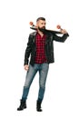 Handsome skateboarder in black leather jacket posing with longboard isolated Royalty Free Stock Photo