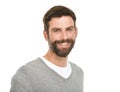 Handsome smiles. Studio shot of a young man smiling at the camera. Royalty Free Stock Photo