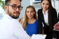 Handsome smiling bearded clerk man wearing glasses Royalty Free Stock Photo