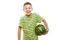 Handsome smiling child boy holding green watermelon fruit Royalty Free Stock Photo