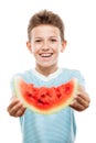 Handsome smiling child boy holding red watermelon fruit slice Royalty Free Stock Photo