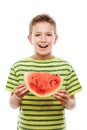 Handsome smiling child boy holding red watermelon fruit slice Royalty Free Stock Photo