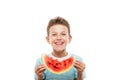 Handsome smiling child boy holding red watermelon fruit slice Royalty Free Stock Photo