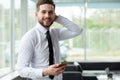 Handsome smiling confident businessman portrait in office. Royalty Free Stock Photo