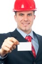 Handsome smiling engineer showing business card