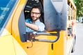 handsome smiling school bus driver looking Royalty Free Stock Photo