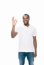 handsome smiling young african american man showing ok sign