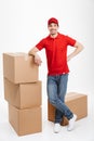 Handsome smiling young delivery man Royalty Free Stock Photo