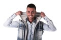 Handsome smiling young man with hoodie and denim vest