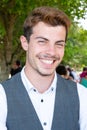 Handsome smiling young man portrait cheerful fashion boy looking at camera Royalty Free Stock Photo