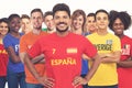 Handsome spanish football fan with group of other european supporters Royalty Free Stock Photo