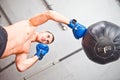 Handsome sports man boxer trains hand