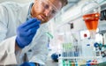 Handsome student of chemistry working with chemicals Royalty Free Stock Photo