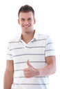 Handsome student smiling with thumb up Royalty Free Stock Photo