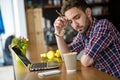 Handsome student studying in restaurant Royalty Free Stock Photo