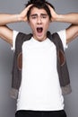 Handsome style. Cheerful young man in smart casual wear looking at camera Emotional people. Royalty Free Stock Photo