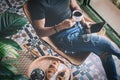 Handsome stylish man in headphones listening to music on electronic tablet and drinking cup of coffee at home. Casual Royalty Free Stock Photo