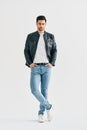 Handsome stylish man full length portrait on white studio background. Royalty Free Stock Photo