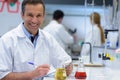 Handsome teacher chemistry working in laboratory Royalty Free Stock Photo