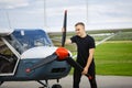 Young man in small plane cockpit Royalty Free Stock Photo