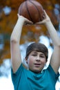 Handsome Teenager with Basketball