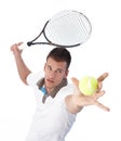 Handsome tennis player serving Royalty Free Stock Photo