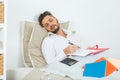 handsome tired businessman with beard sleeping in bed