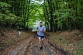 handsome trail runner running in nature