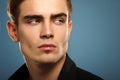 Handsome trendy young man in black shirt, portrait of fashi