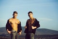 Handsome twin men or bodybuilders