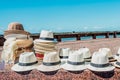 Handsome white Havana hats with black bands on display on the streets