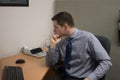 Handsome Young Accountant Working at Office Royalty Free Stock Photo