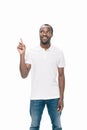 handsome young african american man pointing up with finger Royalty Free Stock Photo