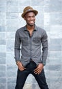 Handsome young african american man smiling with hat Royalty Free Stock Photo