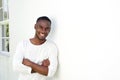 Handsome young african man standing with his arms crossed Royalty Free Stock Photo