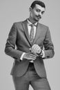 Handsome young arabic businessman with mustache in fashion gray Royalty Free Stock Photo