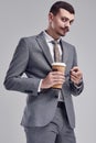 Handsome young arabic businessman with mustache in fashion gray suit Royalty Free Stock Photo