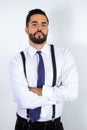 Handsome young bearded businessman in formal wear with crossed arms Royalty Free Stock Photo