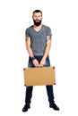 Handsome young bearded man holding a suitcase Royalty Free Stock Photo