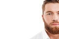 Handsome young bearded man standing over white wall Royalty Free Stock Photo