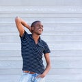 Handsome young black guy smiling with hand behind head Royalty Free Stock Photo
