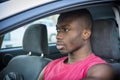 Handsome Young Black Man Driving a Car Royalty Free Stock Photo